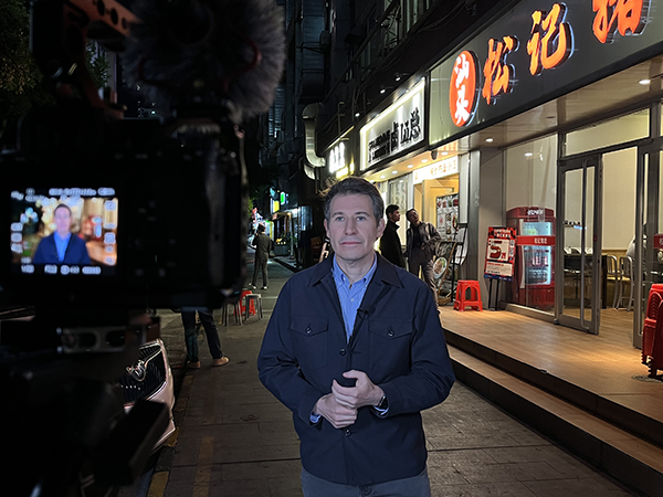 Marc reporting from a street
